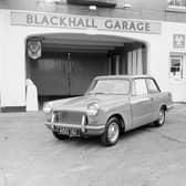 A new Triumph Herald outside the Blackhall Garage in 1961.