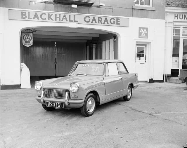 A new Triumph Herald outside the Blackhall Garage in 1961.