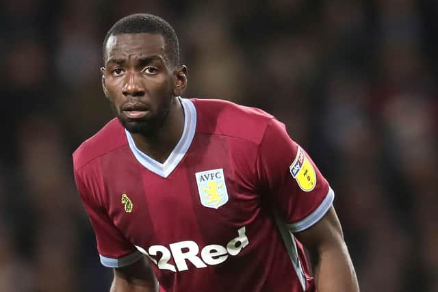 A man who sent racist abuse to footballer Yannick Bolasie, and was then found to have images of child abuse on his phone, has been jailed.