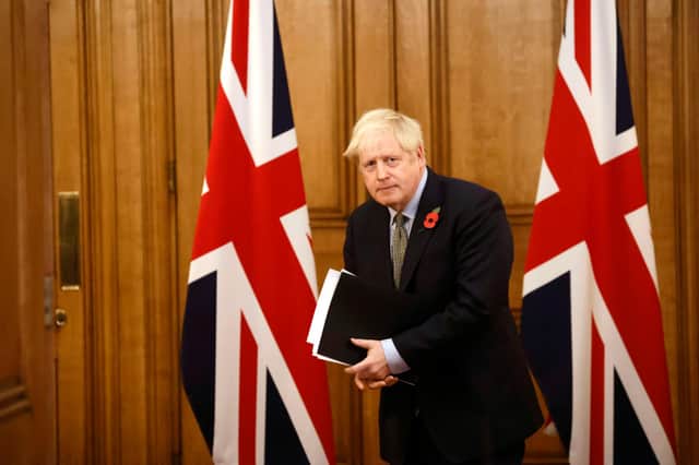 Boris Johnson's 'oven-ready' Brexit deal was as fictional as the infamous Brexit bus pledge about extra funding for the NHS, says Angus Robertson (Picture: Tolga Akmen/WPA pool/Getty Images)