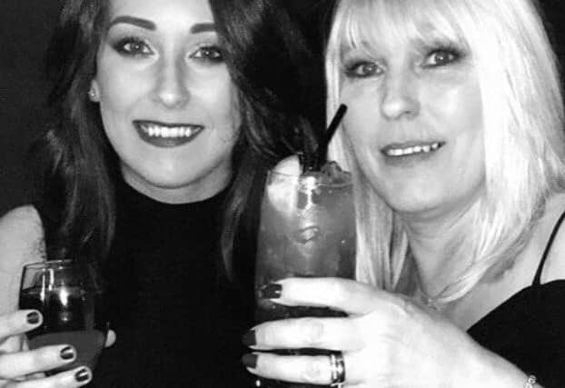 Kirsty Maxwell and her mother Denise Curry enjoying a drink.