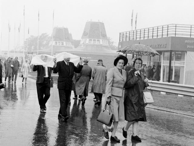 Visitors making their way through the rain and mud at the 1966 Royal Highland Show.