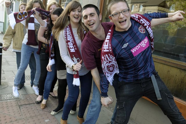 Hearts fans celebrate Hearts 5-1 win over Hibs in the Scottish Cup Final in 2012 outside the Athletic Arms pub in Gorgie.
