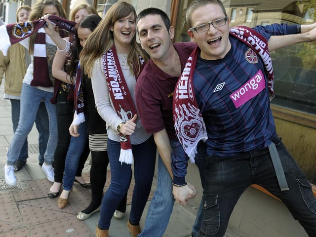 Hearts fans celebrate Hearts 5-1 win over Hibs in the Scottish Cup Final in 2012 outside the Athletic Arms pub in Gorgie.