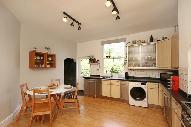 The large fitted kitchen provides plenty of space to cook and dine.