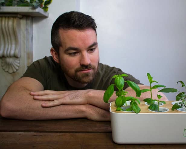 Conor Gallagher, the GSA-trained architect from Belfast now based in London, poses with his GrowPod - a bamboo hydroponic planter looking to offer a sustainable, affordable way to grow fruit, veg and plants indoors despite limited space