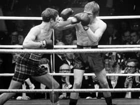 Ken (left) in action in his famous 'Battle of Scotland' fight against Glaswegian Jim Watt in January 1973.