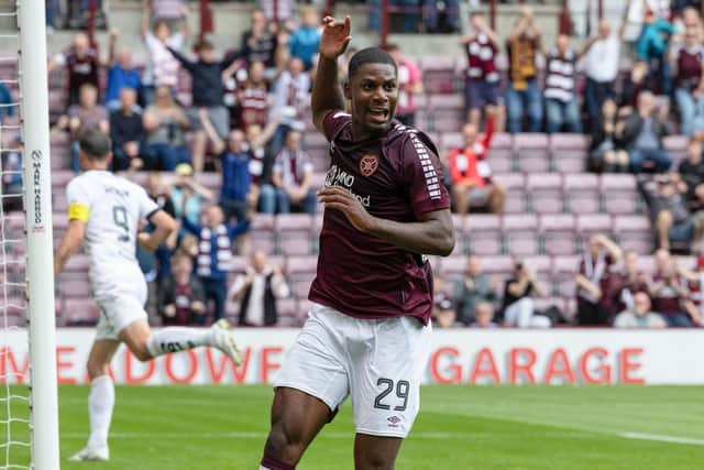 New Hearts loan signing Odel Offiah celebrates after making it 2-0 against Partick Thistle. Pic: SNS