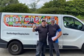 Gus Brindle (right) accepts the winners cheque in the Scottish Canal Championship from sponsor Derek Brady of Glasgow-based Del's Fresh Produce. Contributed by Derek Brady