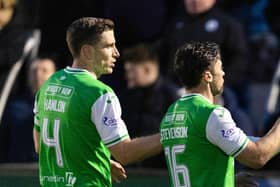 Hibs' Paul Hanlon, left, and Lewis Stevenson, right, are both leaving the club.