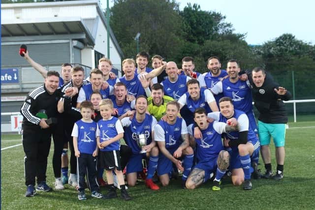 Tollcross United celebrate another cup success in an incredible season