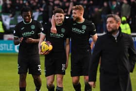 Kevin Nisbet and Ryan Porteous celebrate Hibs' victory at full-time at Fir Park