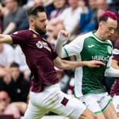 Hibs forward Harry McKirdy is marshalled by Orestis Kiomourtzoglou and Yutaro Oda of Hearts. Picture: Ross Parker/SNS Group