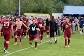 Wayne McIntosh, centre, leads the celebrations for Tranent after their pyramid play-off triumph away to Darvel. Callum Elliot wants to the 37-year-old striker to play next season