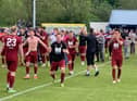 Wayne McIntosh, centre, leads the celebrations for Tranent after their pyramid play-off triumph away to Darvel. Callum Elliot wants to the 37-year-old striker to play next season