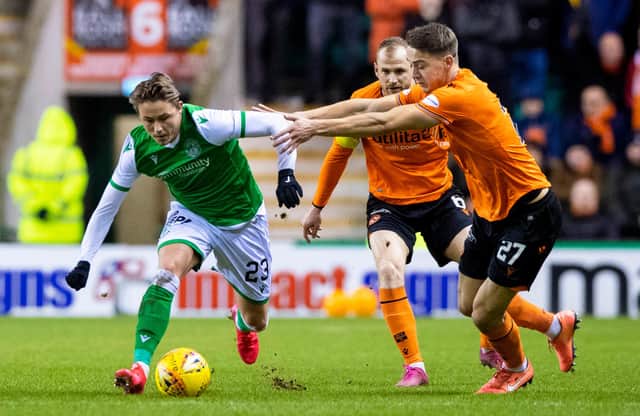 Scott Allan holds off Dundee United's Louis Appere during the Scottish Cup replay between the two sides in January