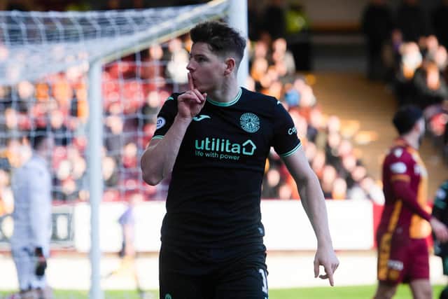 Hibs Kevin Nisbet celebrates in front of the Motherwell fans after scoring his second to make it 2-0. Picture: Craig Foy / SNS
