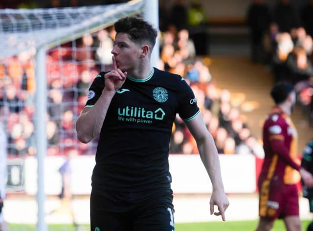Hibs Kevin Nisbet celebrates in front of the Motherwell fans after scoring his second to make it 2-0. Picture: Craig Foy / SNS