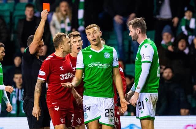 Ryan Porteous is red carded for a foul on Borna Barisic during a Ladbrokes Premiership match between Hibernian and Rangers, at Easter Road, on December 20, 2019, in Edinburgh, Scotland. (Photo by Alan Harvey / SNS Group)