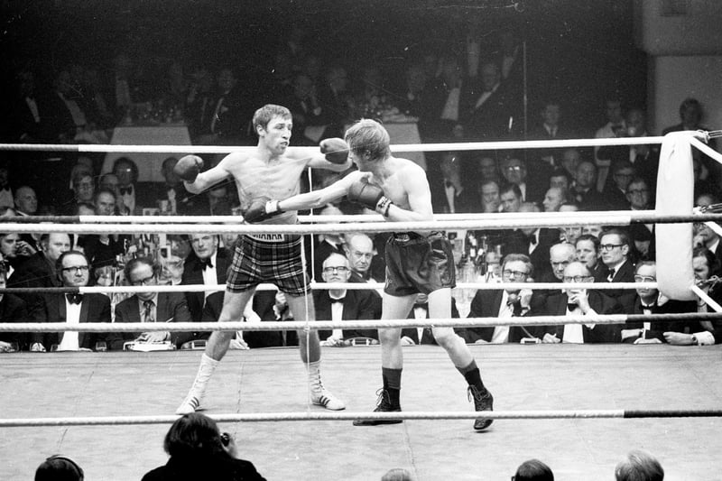 Ken Buchanan taking on Glasgow fighter Jim Watt in a British lightweight boxing match in Glasgow in 1973.  Referee is George Smith of Leith