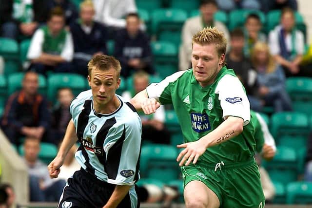 Garry O'Connor of Hibs and Dundee's Neil Barrett vie for the ball during one of the high-scoring encounters