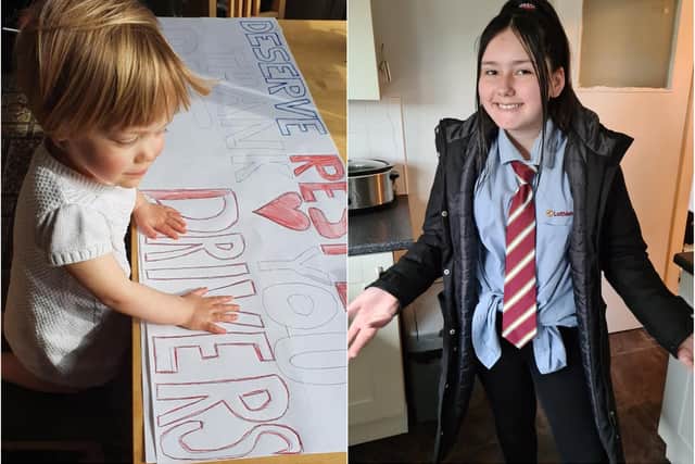 Little Eva Pujdak helps make the poster for her father's taxi, while one yongster dressed like her dad for 'dress like a superhero day' at school in support of Lothian bus drivers. Pictures: Don Pujdak/ Stephanie Lynch