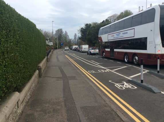 Buses unable to reach bus lane and not a bike in sight!