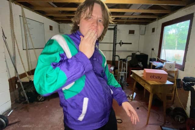 Lewis Capaldi has filmed a hilarious workout video in his garage.