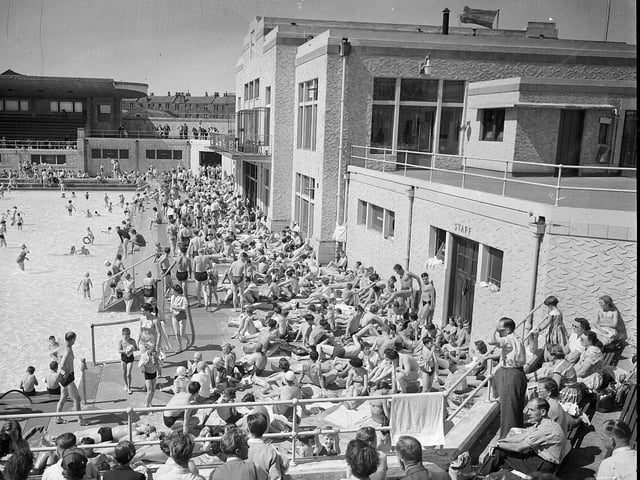 A packed poolside in 1956.