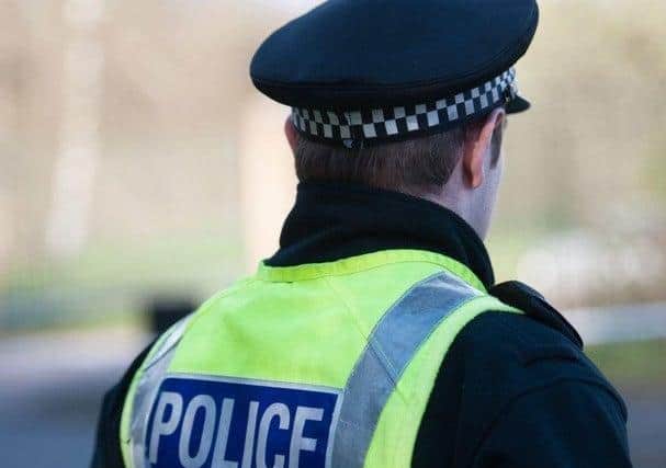 Officers caught the driver with no hands on the steering wheel
