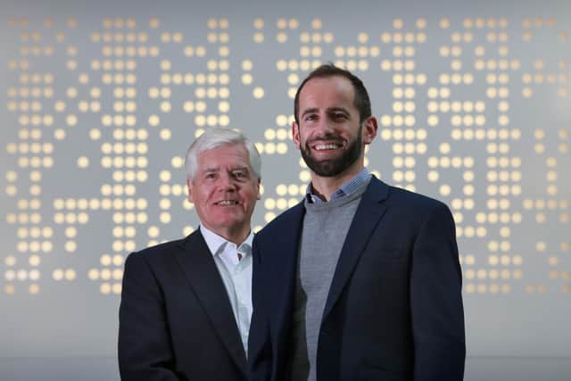 Callum Murray with Amiqus chairman Sir Sandy Crombie, describing him as "that invaluable person that every entrepreneur needs". Picture: Stewart Attwood.