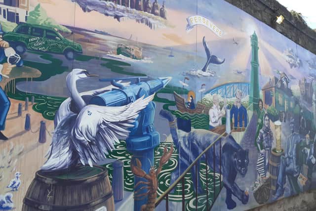 The mural tells the story of Leith and includes lots of local characters.