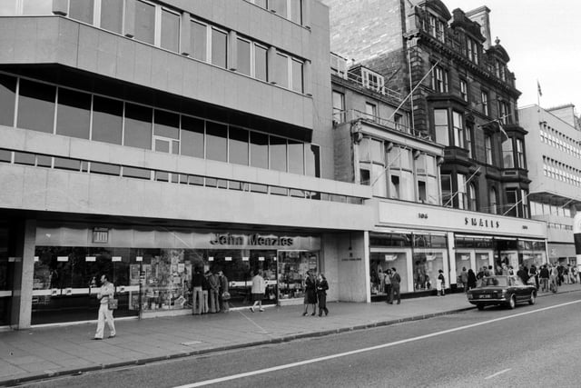 John Menzies, newsagents and stationers, and Smalls department store in Princes Street Edinburgh, July 1977.