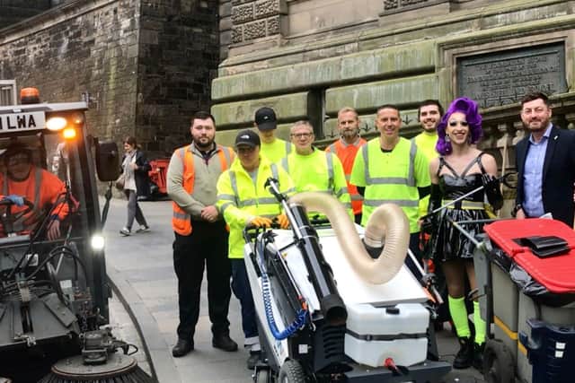 Joe Leather, who premieres his fringe show ‘Wasteman’ tonight at Assembly George Square, assisted cleansing staff on Cockburn Street today