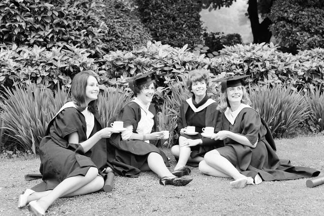 A group of Edinburgh University graduates relax in the gardens at George Street in July 1963.