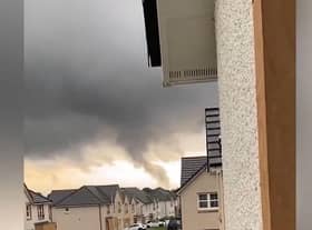 A tornado was spotted in Midlothian as heavy rain and thunderstorms swept parts of the country.
