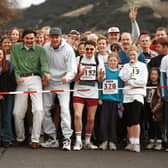 Grant Stott and brother John Leslie at the starting line of the Evening News Charity Walk in 1994 with participants.