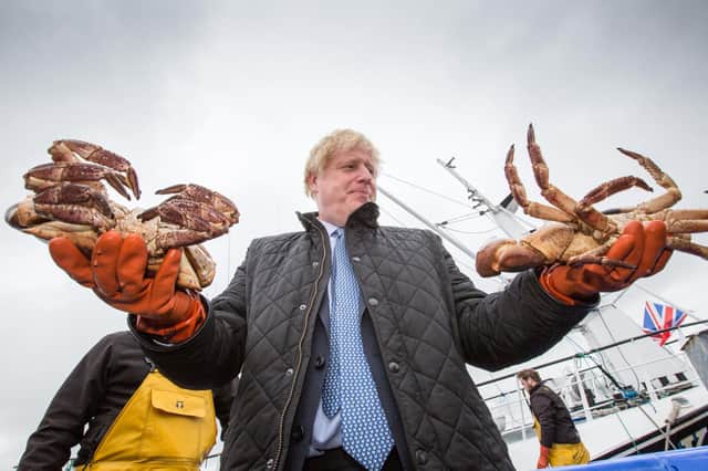 Boris Johnson visited Stromness harbour  in Orkney during his trip to Scotland (Picture: Robert Perry/PA)