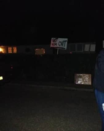 Demonstrators outside the property in Humbie