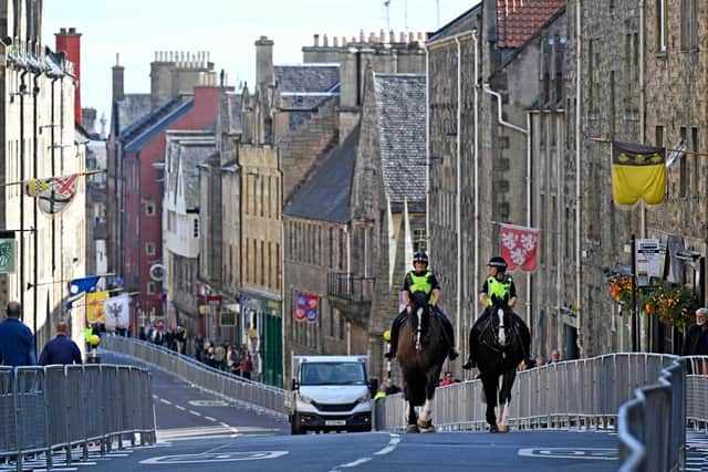 Mounted Police officers are seen on the Royal Mile in Edinburgh on September 10, 2022, as preparations continue for the arrival of Queen Elizabeth's coffin over the weekend (Photo by NEIL HANNA/AFP via Getty Images)