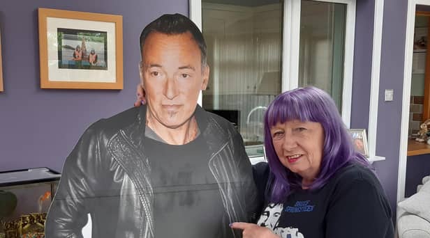 Angel McArthur with a carboard cut out of Bruce Springsteen - she danced with the real thing on stage in Edinburgh 42 years ago