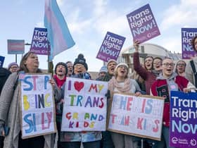 Supporters of the Gender Recognition Reform Bill (Scotland) take part in a protest outside the Scottish Parliament, Edinburgh, ahead of a debate on the bill