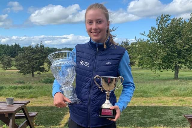Royal Troon member Freya Russell with both the Stephen Gallacher Foundation Vase and the Bobby Johnston Trophy at Castle Park. Picture: SGF