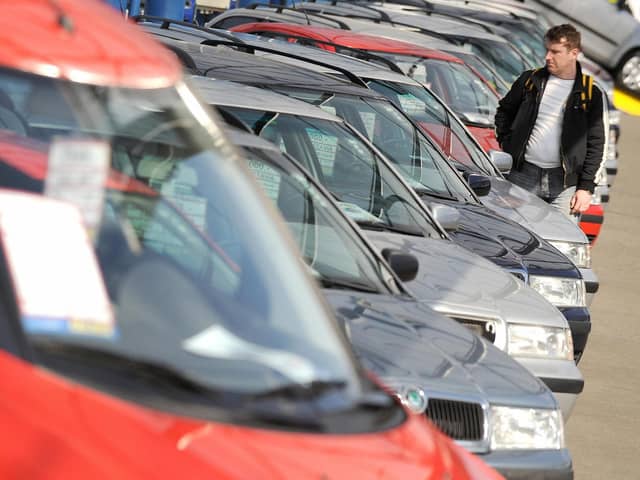 There are reputable second-hand car dealers, and then there's Vladimir McTavish's daughter (Picture: Michal Cizek/AFP via Getty Images)