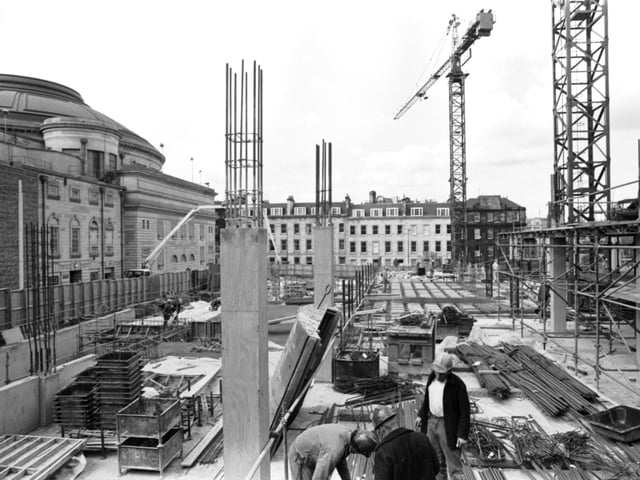 Construction continues at the gap-site next to the Usher Hall between Castle Terrace and Cambridge Street Lane  in Edinburgh, April 1990. Sited on the former Poole's Synod Hall, the building became Saltire Court.