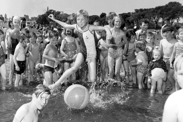Children in the paddling pool at St Margaret's Loch in Holyrood Park as temperatures soared in July 1966.