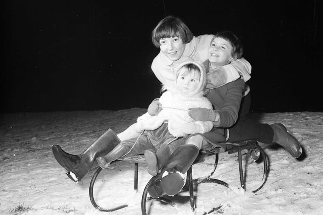 Sledging on Saughton Road- 1 year old Brenda Bomford , Lorraine McVicar (9) and Moira Murdoch (13)  in 1959