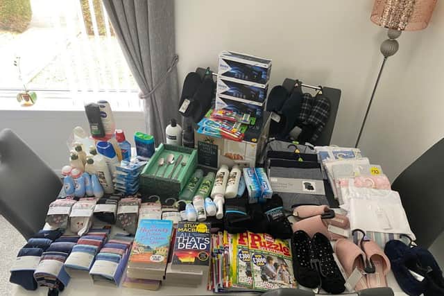 The couple bought slippers, pyjamas, toiletries and books on Monday.