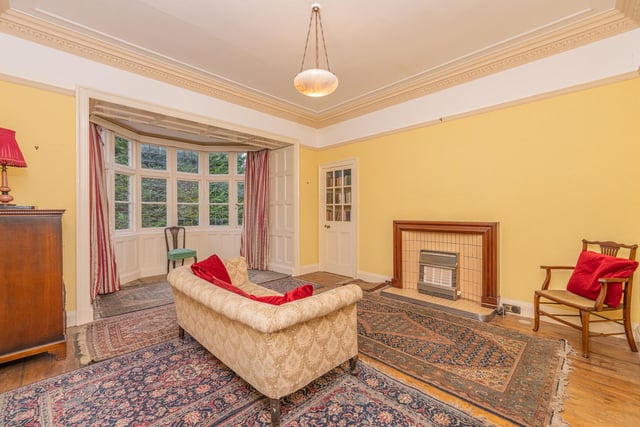 The second family room in this property. Whilst needing modernised, this is another large room for relaxing.