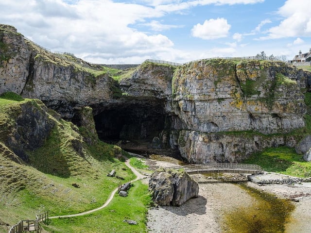 Smoo Cave, the large sea cave in Durness in Sutherland, where a young John Lennon would go exploring with his cousin Stan Parkes when they were youngsters.